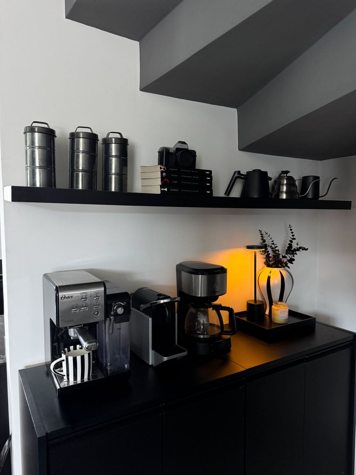 Home cafe coffee station details with cups and brewer