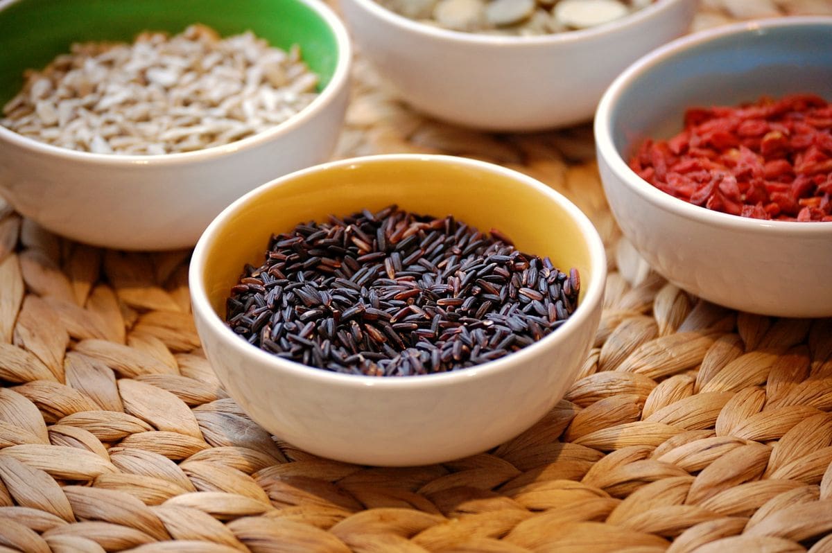 Colorful high-fiber bowls with beans, grains, and produce