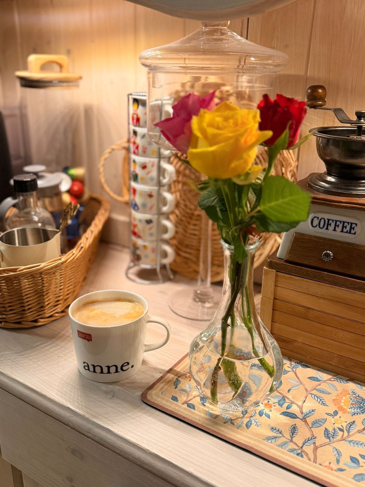 Styled home coffee bar setup with espresso machine and shelves