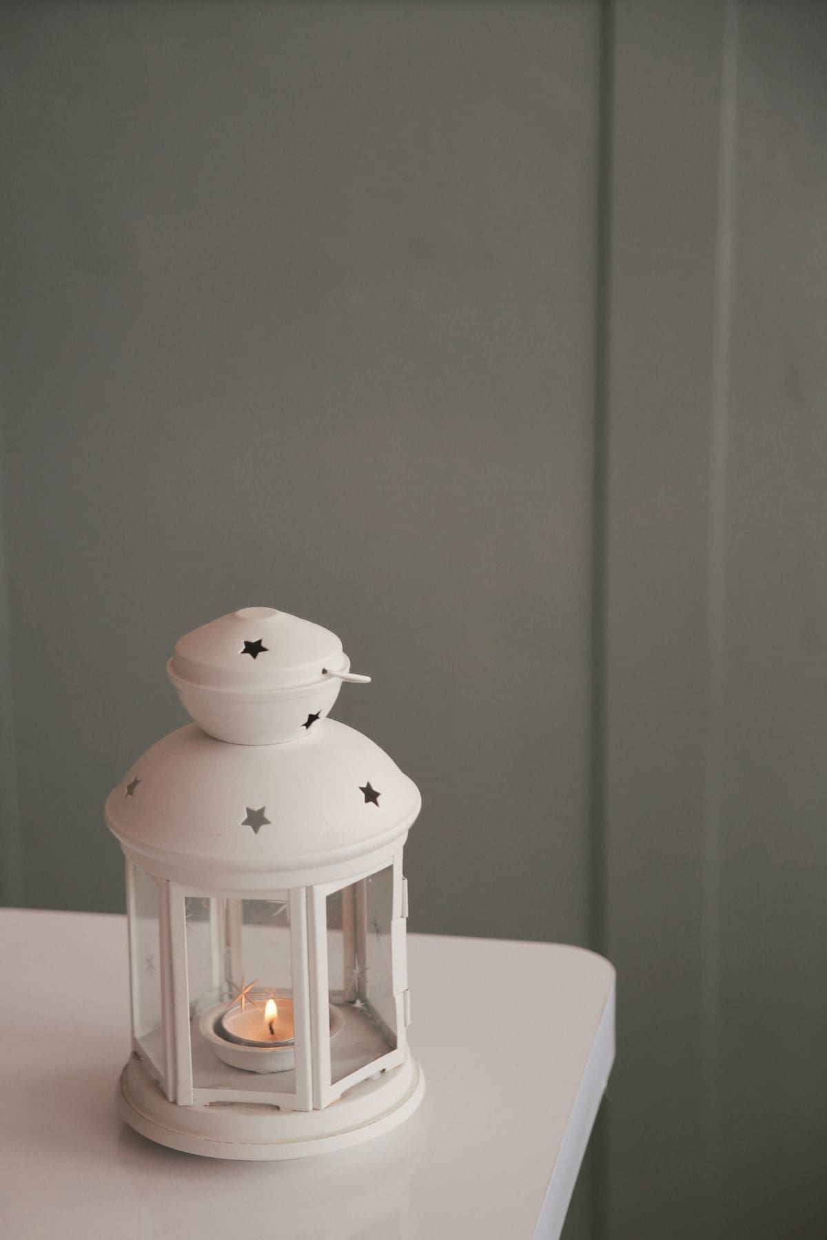 Warm lantern light in a cozy, ready household