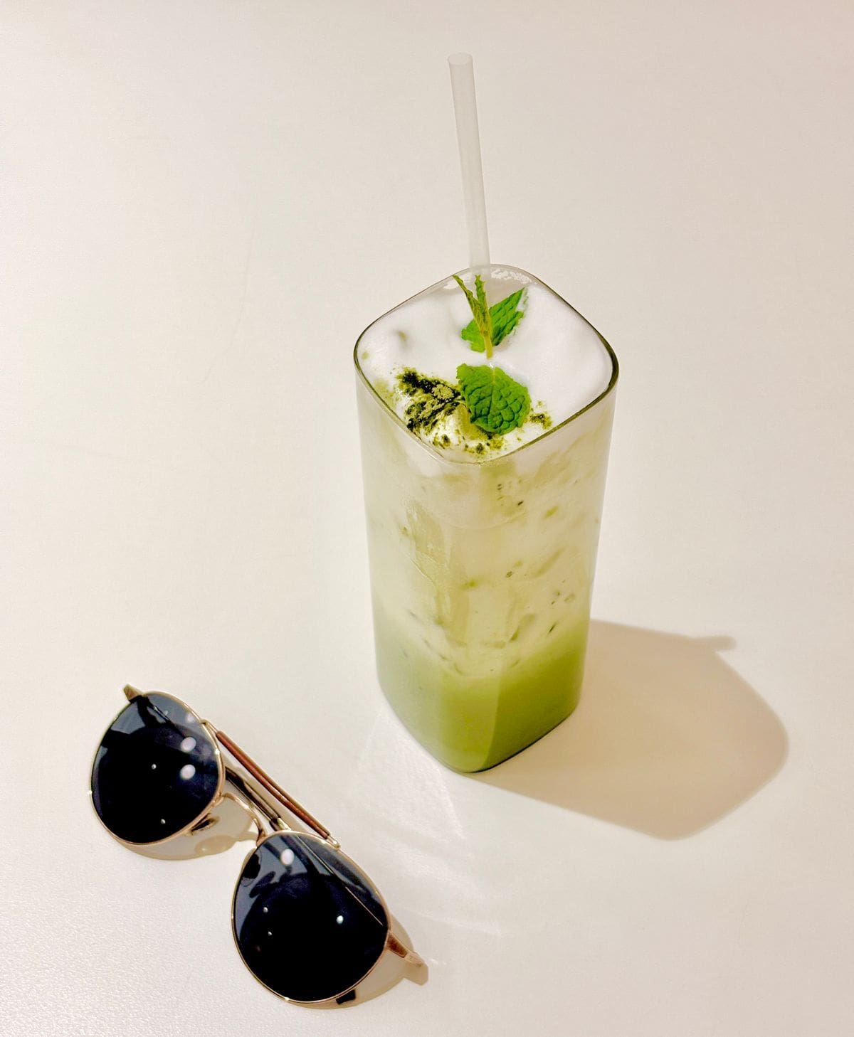 Iced matcha latte made at a home coffee bar