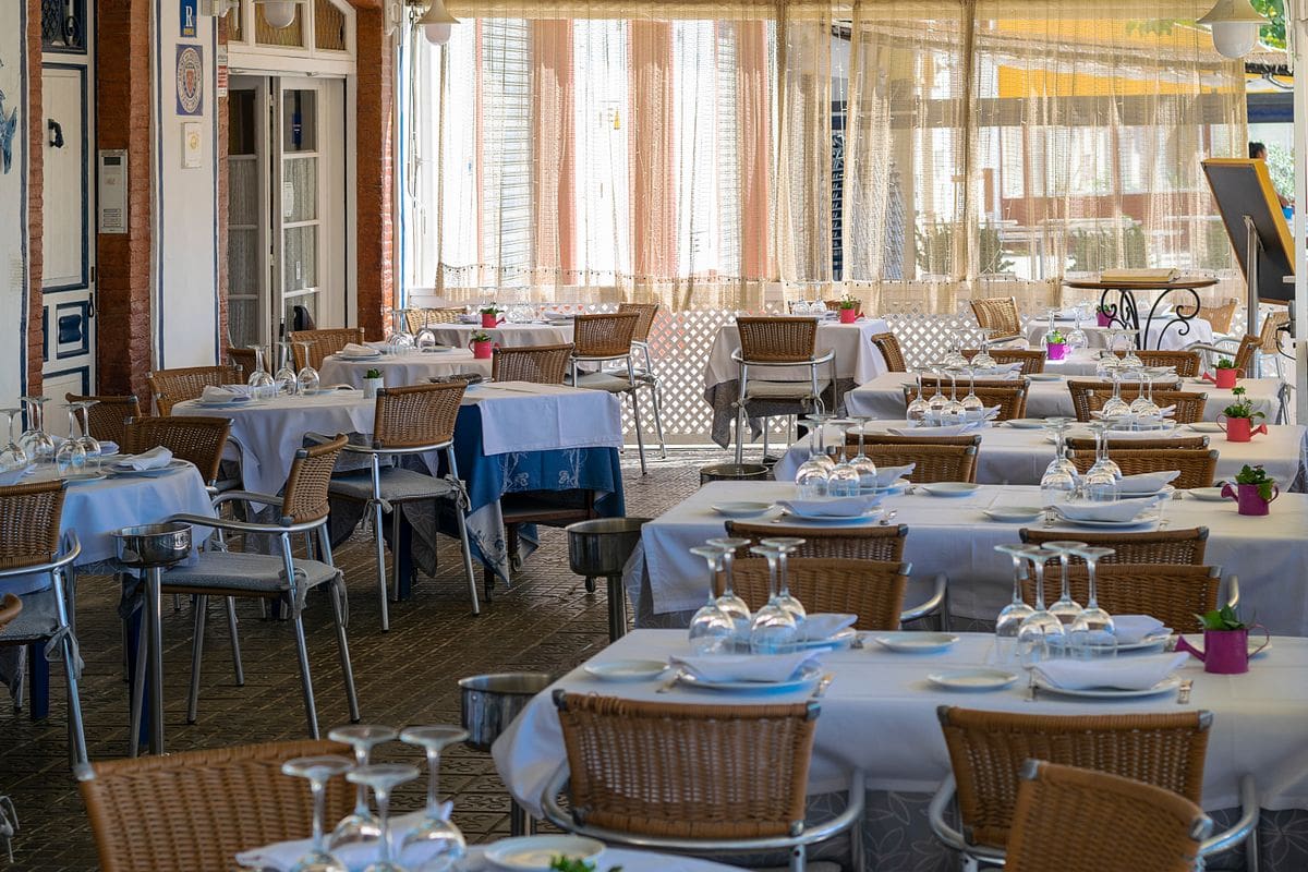 Sunlit Mediterranean restaurant dining room like Ikaria La Jolla