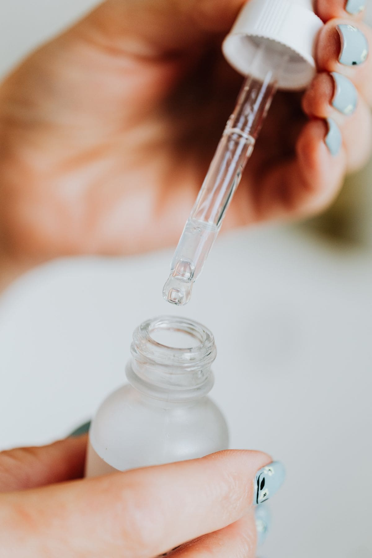 Skincare serum dropper with skin longevity ingredients like beta-glucan